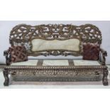 A carved Chinese hardwood and marble three piece lounge suite,