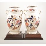 Pair of tall Mason's Mandalay vases with wooden stands and a similar clock,