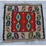 Small Persian mat, two tiles within stylised patterned field border, 58 x 52cm,