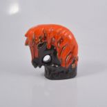 Eric Leaper, a pottery model of a horse head, running burnished orange glaze over a manganese body,