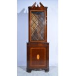 Reproduction mahogany finish freestanding corner cupboard, glazed door to the upper section, W65cm,