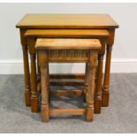 Nest of three oak occasional tables.