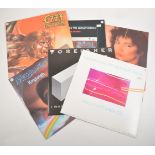 Box of 12" vinyl records singles, mostly pop from the 1980s and 1990s, including artists such as,