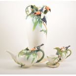 Franz porcelain, a large vase, and a three-piece bachelors' teaset, all modelled with toucan design,