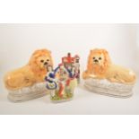 Pair of Staffordshire lions, modelled reclining, five pairs of dogs,