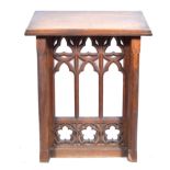 Victorian oak reading stand, rectangular platform, carved and pierced panel, height 112cm.