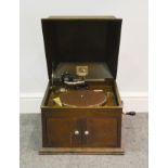 HMV oak case table-top gramophone, 47cm; small collection of records.
