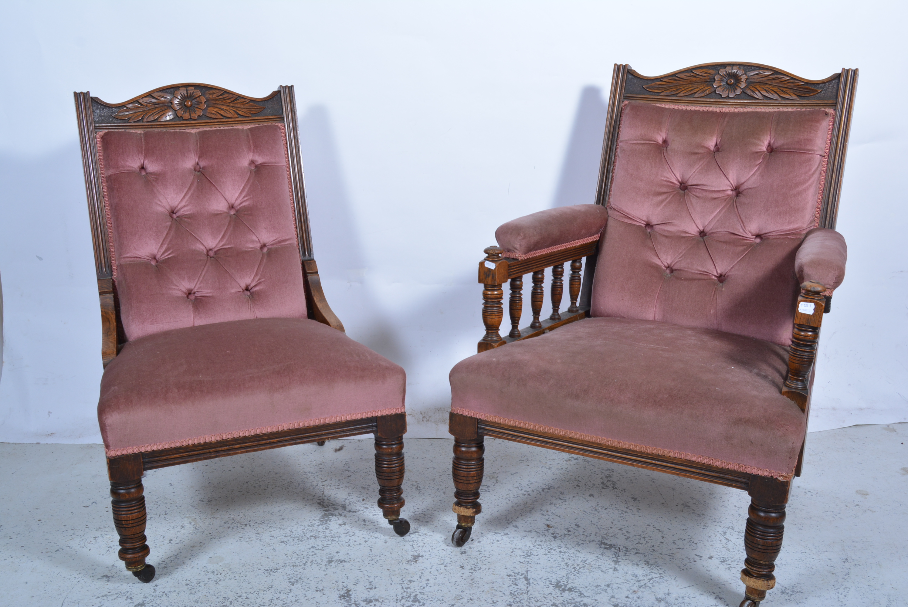 Victorian oak gentlemans armchair, stylised flower and leaf pediment, galleried arms,