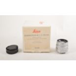 Leica Summicron-M 1:2/50mm camera lens, with box.