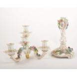 Pair of Dresden four light candelabra, and a pair of candlesticks, with floral decoration,