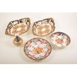 Two Royal Crown Derby dishes, Imari pattern, together with two others and a small vase,