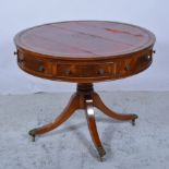 Reproduction Regency style mahogany drum-top table, leather inset, damaged,
