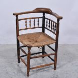 19th Century oak corner elbow chair, with seagrass seat.