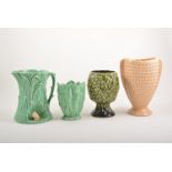 Five Sylvac pottery vessels and two other pottery vases.