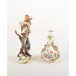 Capo di Monte figure of boy playing a flute and Dresden bottle vase,