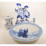 Modern Delft group, blue and white painted decoration, height 32cm,