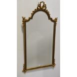 A modern gilt framed wall mirror in the antique style,