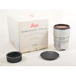 Leica Summicron-M 1:2/90mm camera lens, with box.
