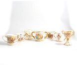 Selection of commemorative ware loving cups, mostly to commemorate George V and VI,