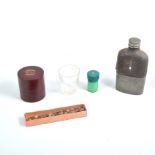 Assorted nutcrackers, bottle opener, Victorian glass eye baths and medicine measures,