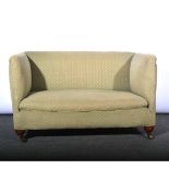 Small two seat green upholstered sofa,