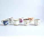 Collection of twelve porcelain mugs and cups,