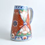 Chinese porcelain flagon, tapering form, polychrome decorated with floral panels,