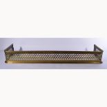 Brass fireguard, pierced detailing, length 123cm, height 16cm, depth 31cm.