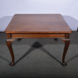 Victorian mahogany pull-out dining table, two extra leaves, cabriole and pad feet.