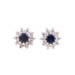A pair of sapphire and diamond circular cluster earstuds,