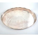 An oval electroplate tray, pierced gallery sides, engraved with a family tree, 59cm wide,