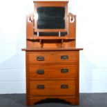 Victorian satin walnut dressing table, rectangular mirror above a shelf,