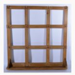 Metal bar with seven game hooks 153cm long, a pine wall unit with twelve hooks 84cm x 80cm,