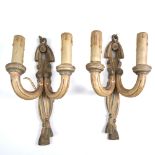 Pair of painted carved wooden two-light wall sconces,