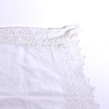 Lace makers pillow with a collection of bone bobbins,