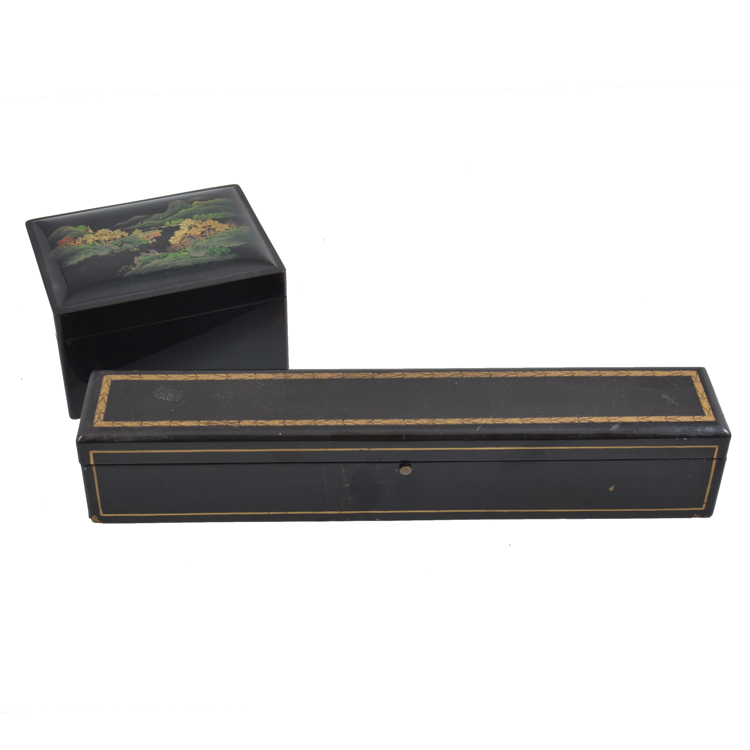 A black lacquered Japanese box, two other lacquered boxes,