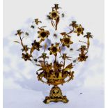 Gilt metal and opaque glass lily form nine light candelabra, issuing from an urn, triangular base,
