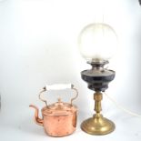 Two copper kettles, pair of carved oak table lamps,