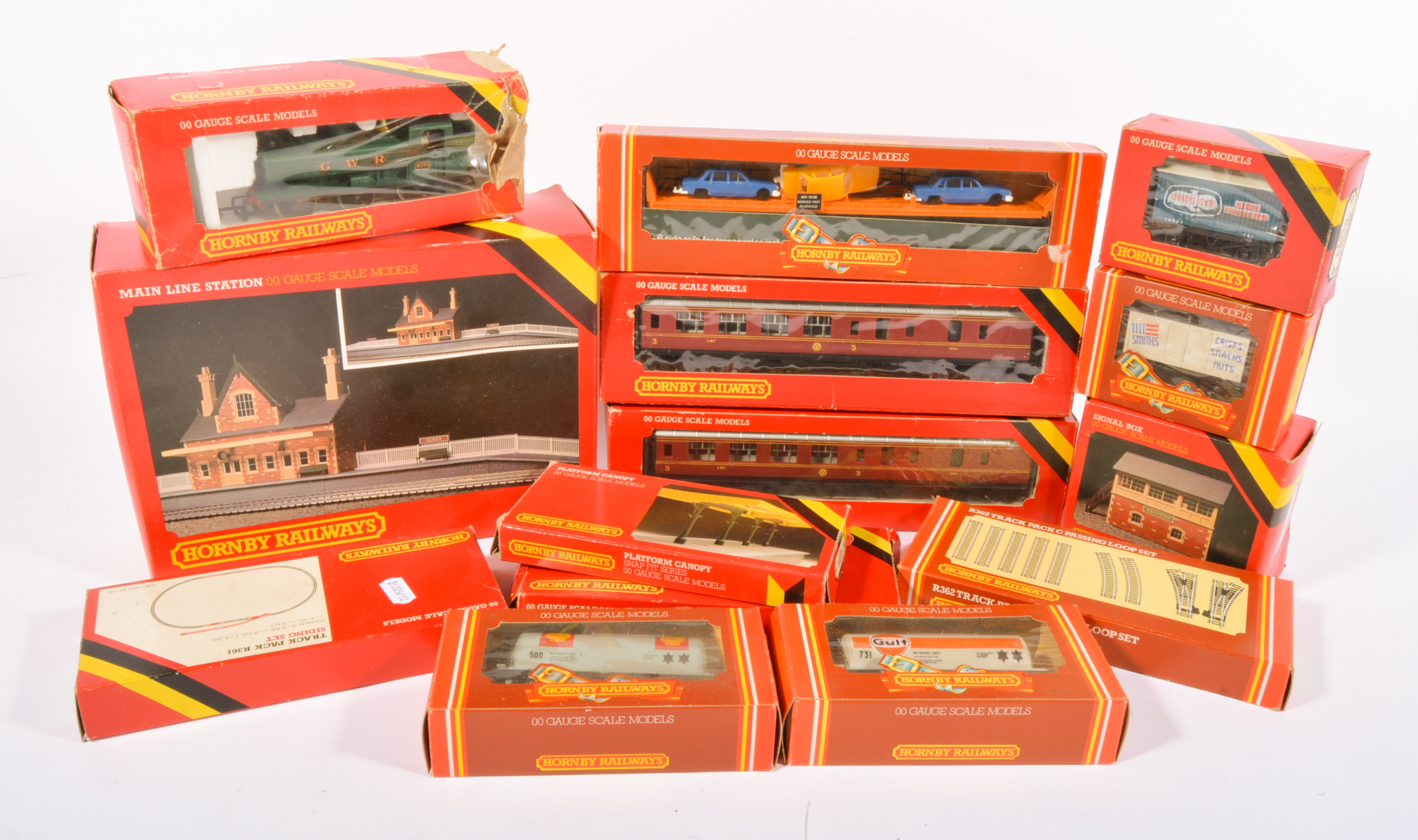 Hornby 00 gauge railway, including one locomotive, selection of wagons and coaches, etc.