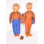 Two Belguim papermache dolls, c1930s in age with painted features and felt clothing,