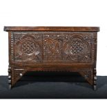 Lebanese Druze chest, rectangular hinged boarded top, carved front and brackets, width 107cms,