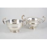 Two similar silver twin handled bowls,