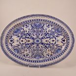 English pottery, large oval meat plate, Willow pattern, and other blue and white pottery.