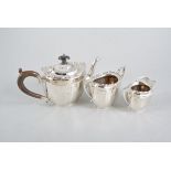 A silver three piece teaset,