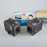 Box of vintage cameras