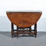 Small joined oak, drop-leaf table, 18th Century, the oval top with two fall leaves, turned gates,