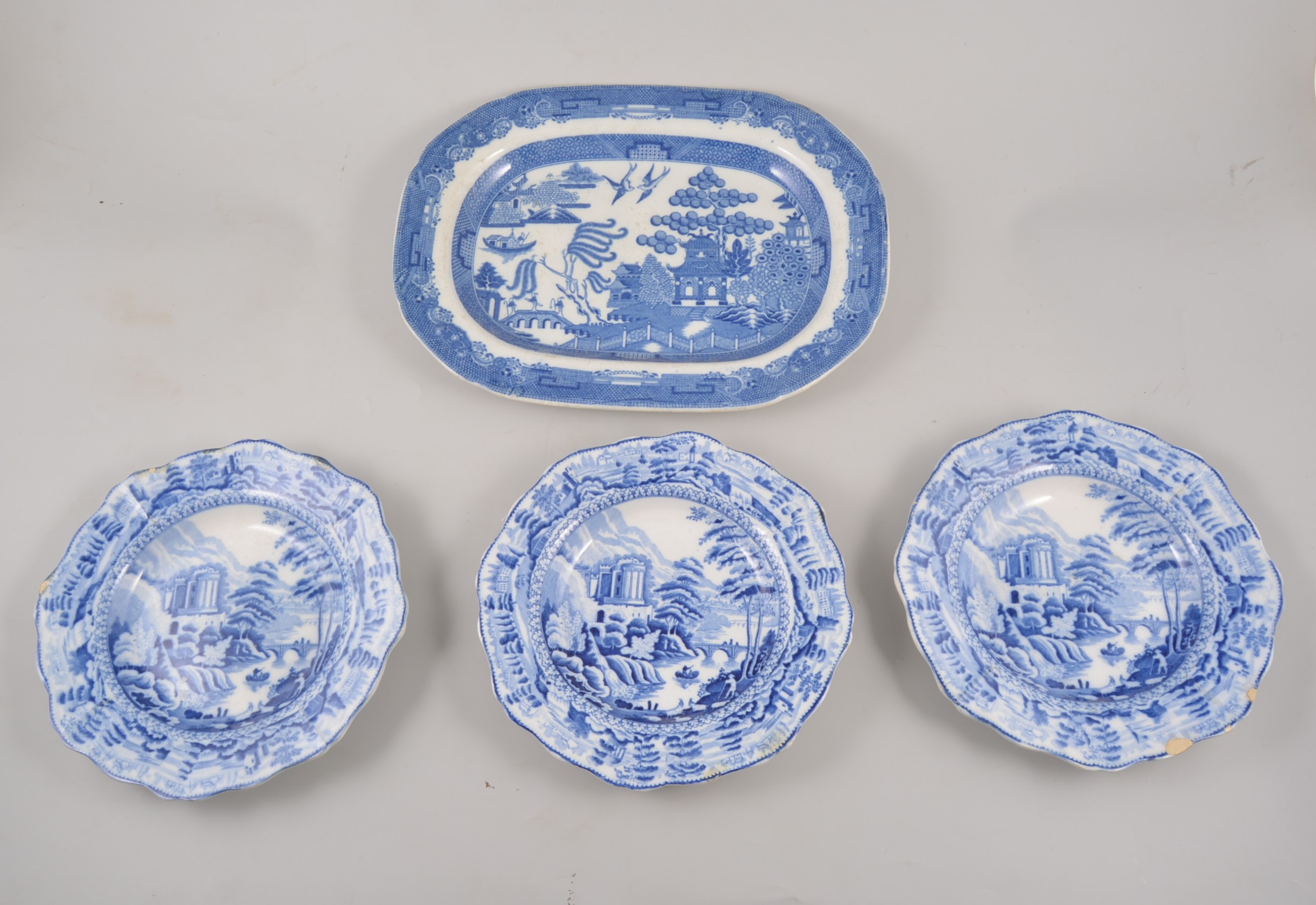 Four transfer ware dishes, a set of Riley's semi-china soup plates and other plates.