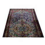 Bijar deep pile rug, with central medallion on a flower field field, narrow borders, 297 x 156cm.