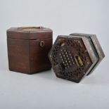A Lachanel & Co Patent Concertina the hexagonal fret-cut rose wood ends with forty-eight buttons