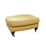 Victorian style stool, old gold cotton upholstery, turned legs, brass toes and castors, 77 x 55cm.